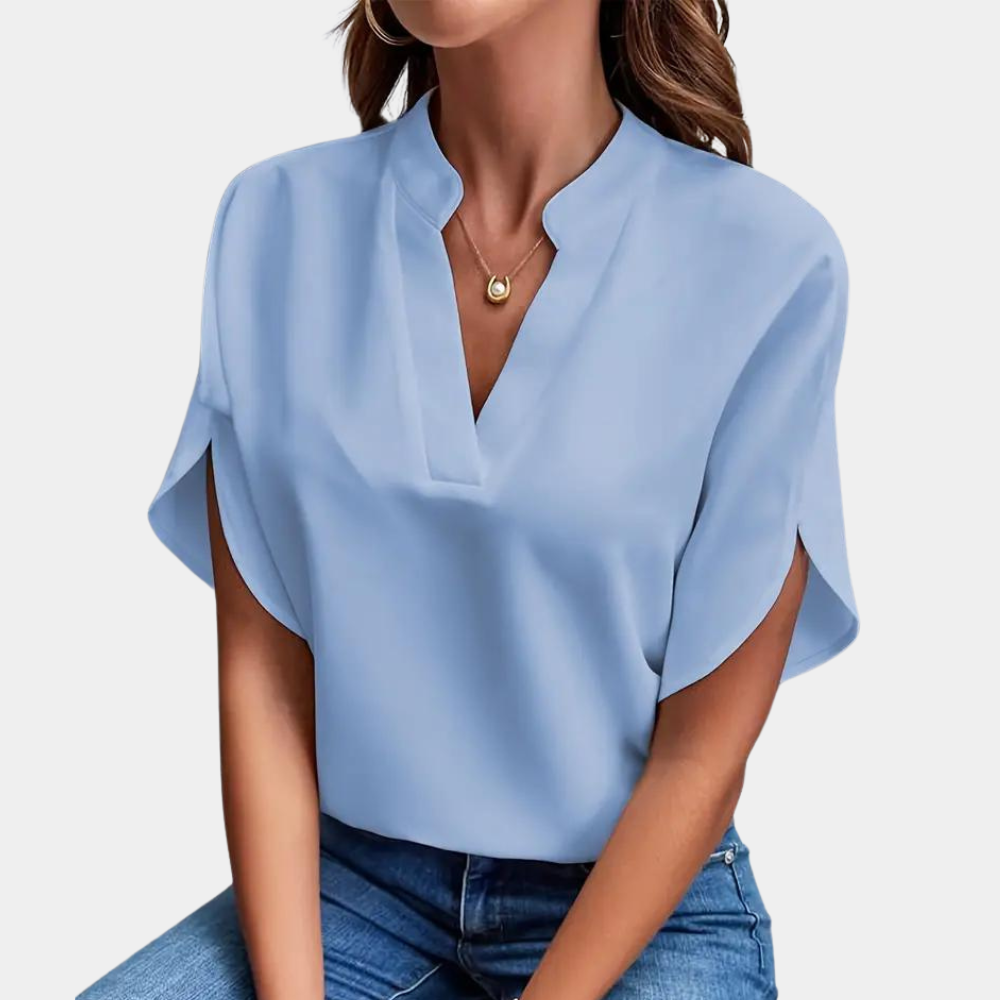 Blauwe effen dames blouse met v-hals en korte mouw